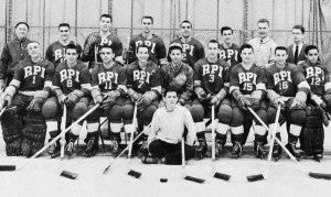 Team photo, 1958-59.  First row:  R. Ottone, D. Seminski, R. Belaski, P. Midghall (co-captain), N. Harkness (coach), K. Balland (co-captain), L. Bradley, B. Dunn, G. Lee.  Second row:  “Pop” Harkness, P. Chiarelli, T. Holbrook, R. Groves, L. McMullen, M. Eustace, D. Wishart (assistant coach), C. Borck (manager).