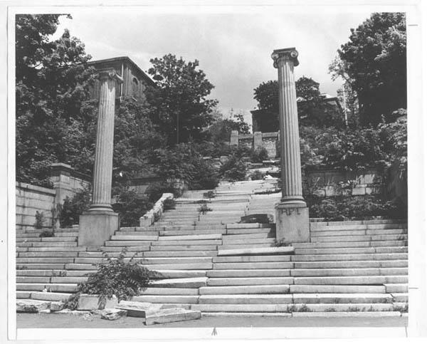 Photograph of the Approach in serious disrepair, with stone steps out of place and much plant overgrowth (view looking uphill toward Eighth Street, date likely circa 1970s