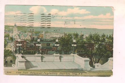 Front of a color-tinted photo postcard depicting the top of The Approach, looking west over the city of Troy