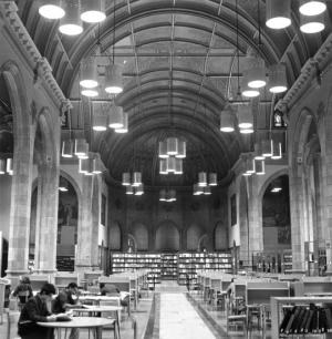 Students studying inside the open expanse of the Chapel, when it was temporarily being used as the campus Library (view facing east, date unknown)