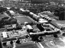 Aerial photograph of Rensselaer campus, with Service Building visible just above the E-dorms, near upper right of photo (circa 1949)