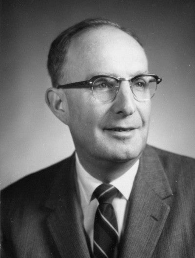 Black-and-white head-and-shoulders photograph of Clayton Dohrenwend