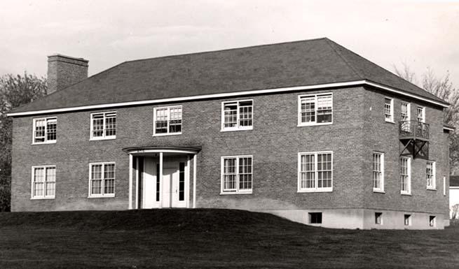Exterior view of the entrance to the two-story auxiliary dormitory located at 2 Eaton Road (west-southwest elevation, date known)