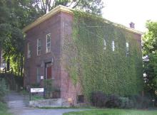 Exterior view of teh Black Cultural Center located along Ninth Street (northeast elevation, date unknown)