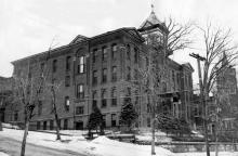Exterior view of the four-story brick Mason House/Laboratory, as seen from Peoples Avenue (northwest elevation, date unknown)