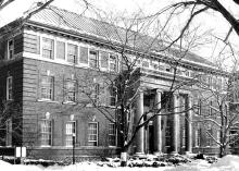 Exterior view of the entrance to the Troy Building (southwest elevation, date unknown)