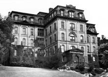 Exterior view of West Hall (west-northwest elevation, as viewed up the hill from Eighth Street, date unknown)